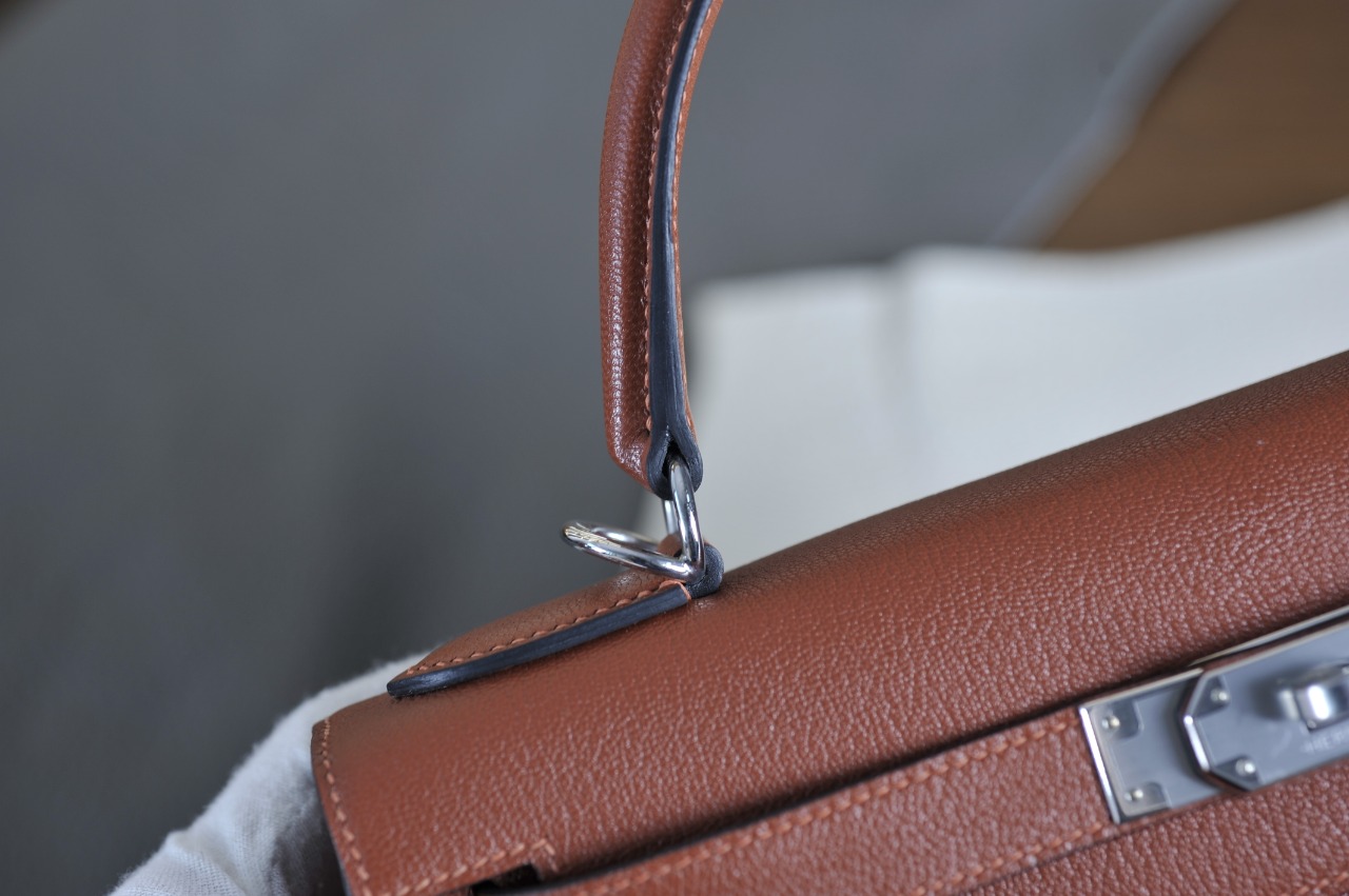 Kelly 28 brick red silver buckle French sheepskin