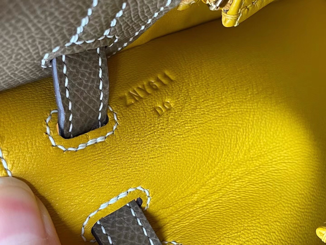 Kelly25 Elephant gray epsom leather with amber yellow inside and frosted gold buckle