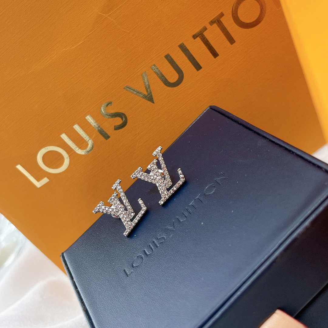 Louis Vuitton Spring/Summer LV monogram earrings in yellow gold and white gold