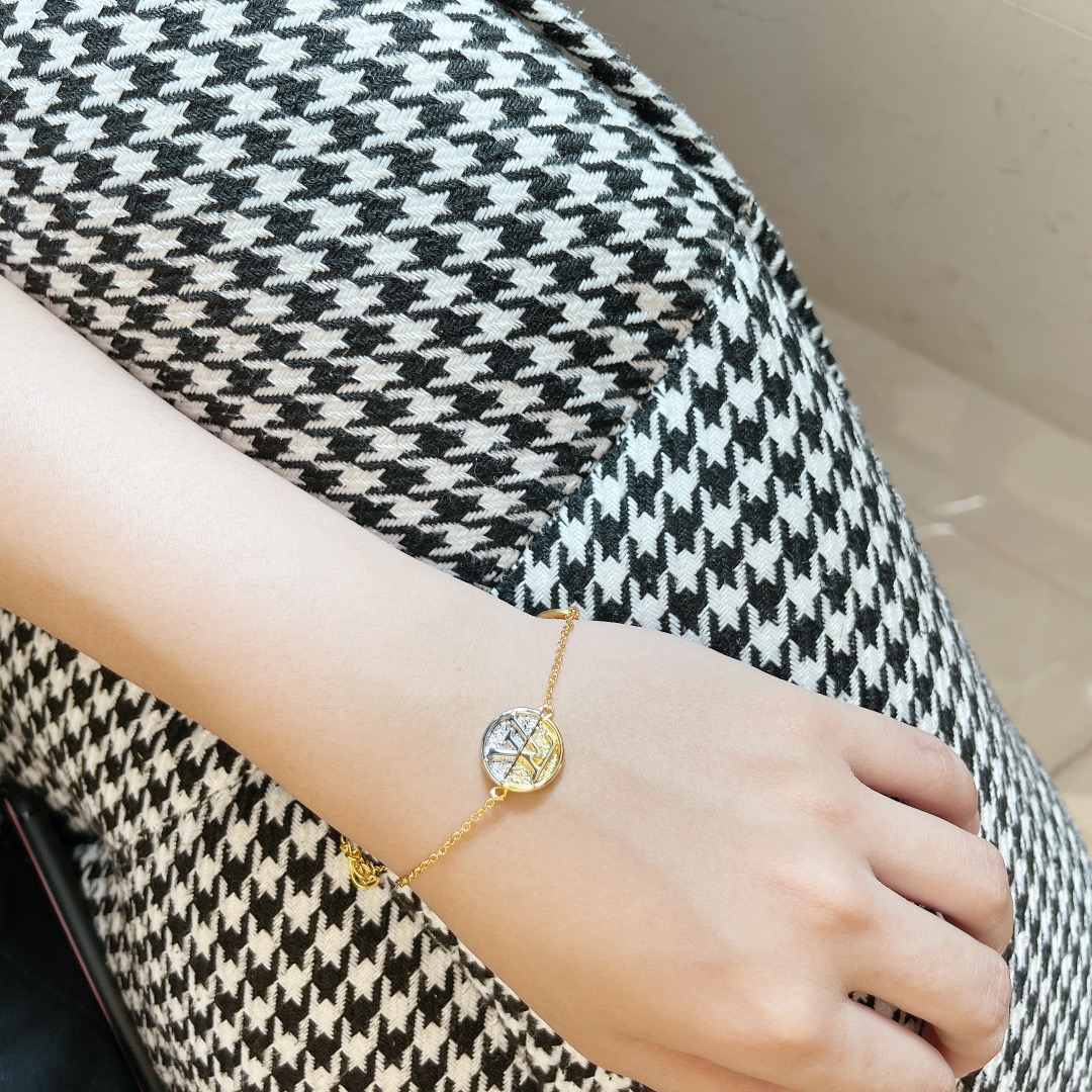 Louis Vuitton Early Spring Two-tone LV monogram bracelet in a circle
