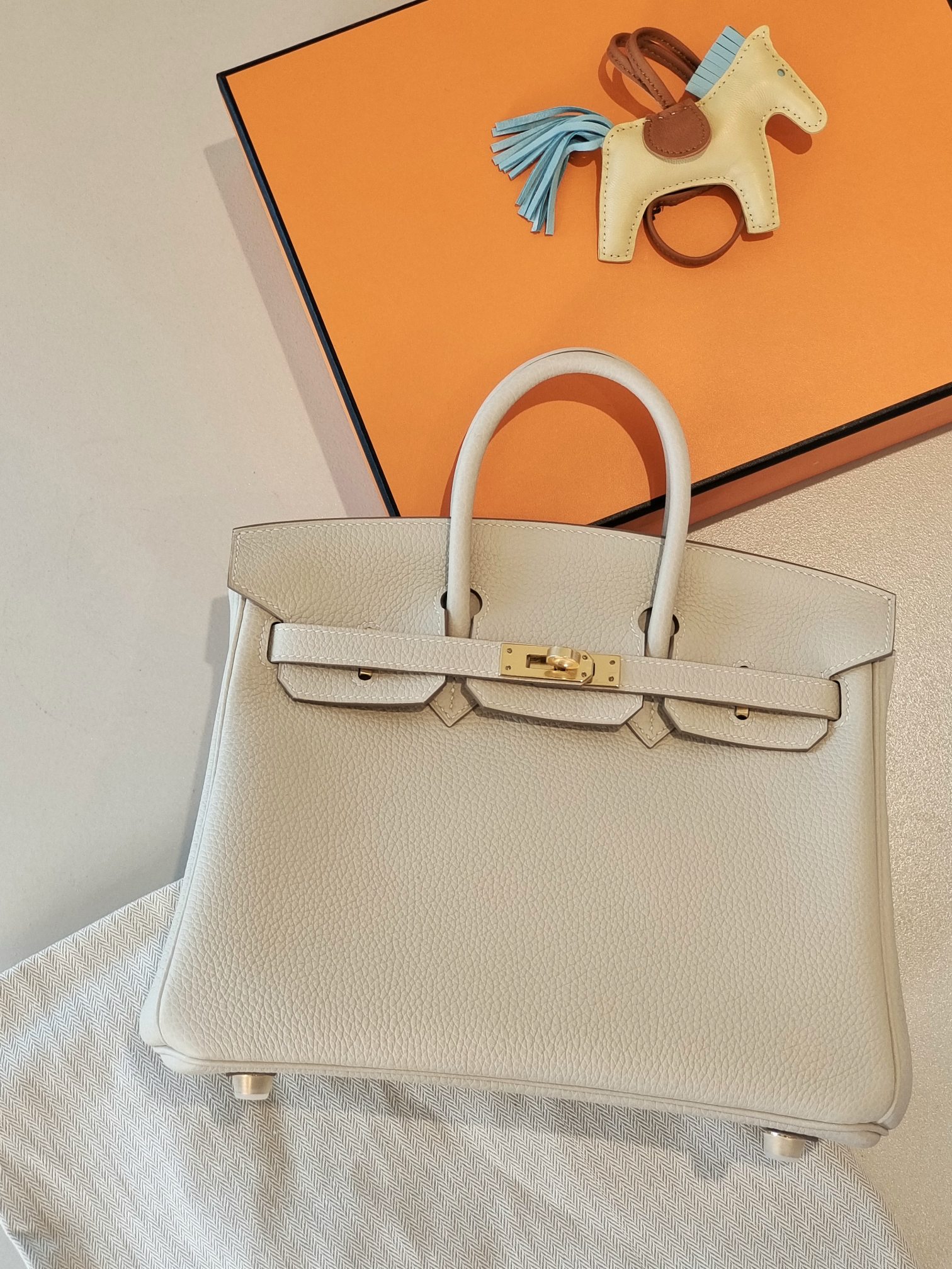 BK25 milkshake white togo leather gold buckle