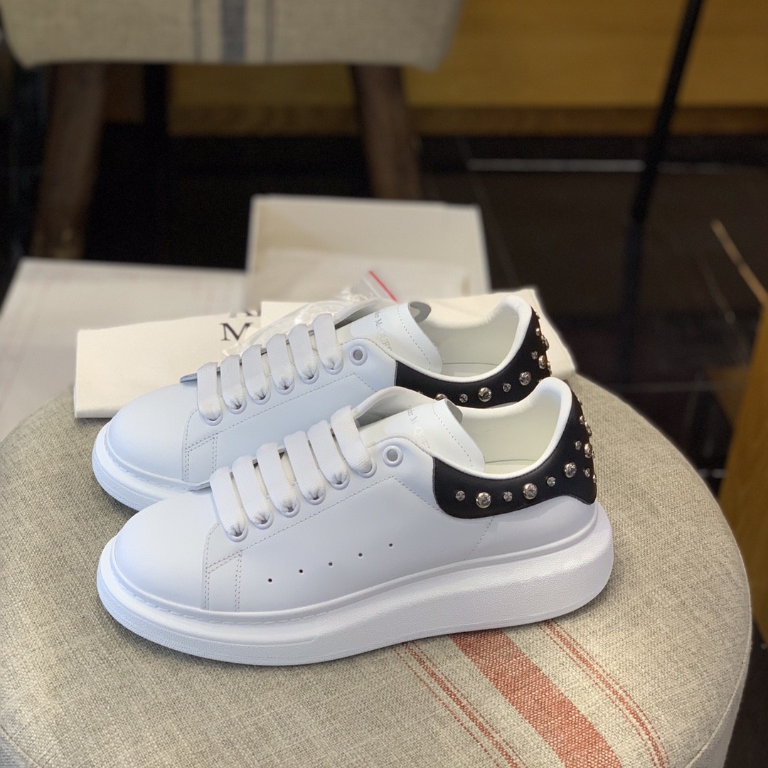 Alexander McQueen MQ Cross nail tail Sneakers
