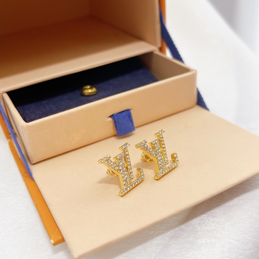 Louis Vuitton Spring/Summer LV monogram earrings in yellow gold and white gold