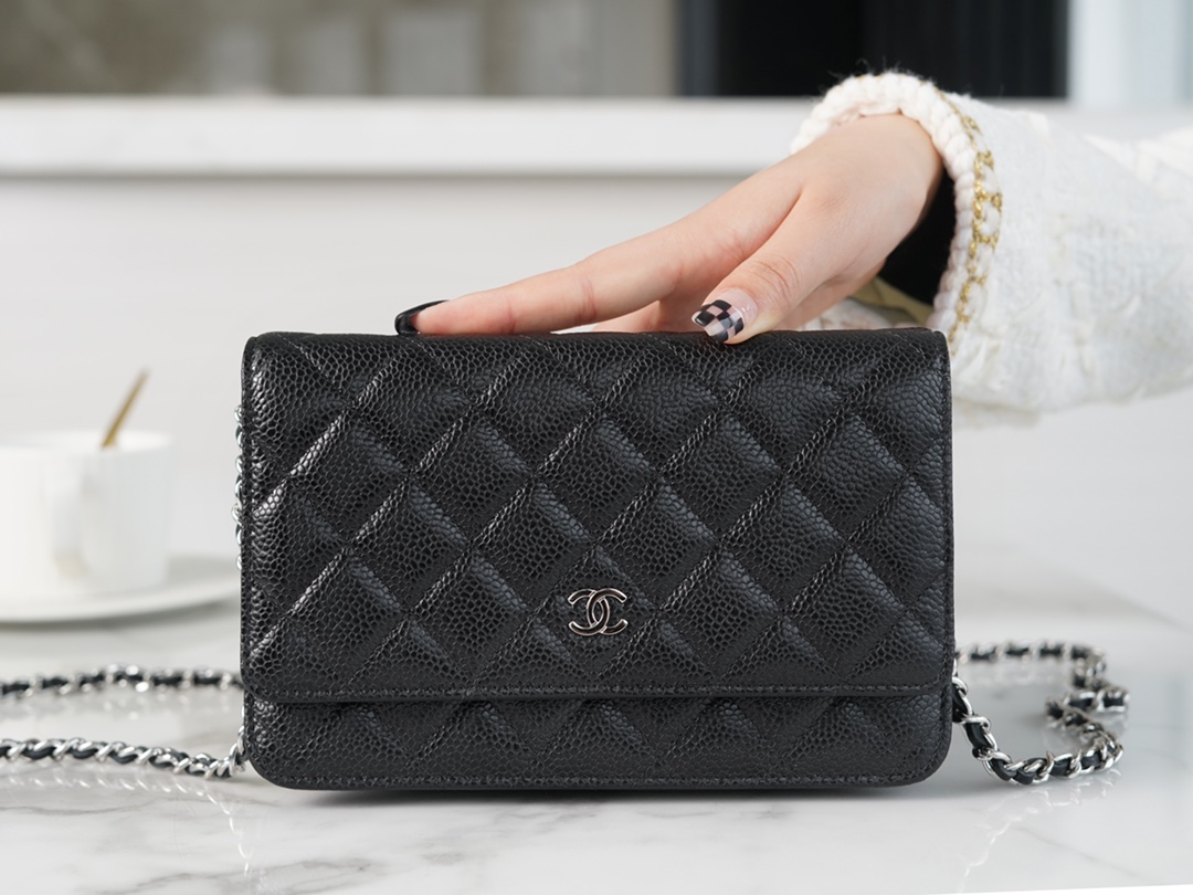 Chanel 𝑾𝒐𝒄 hair bag (press button version) leather black cow silver