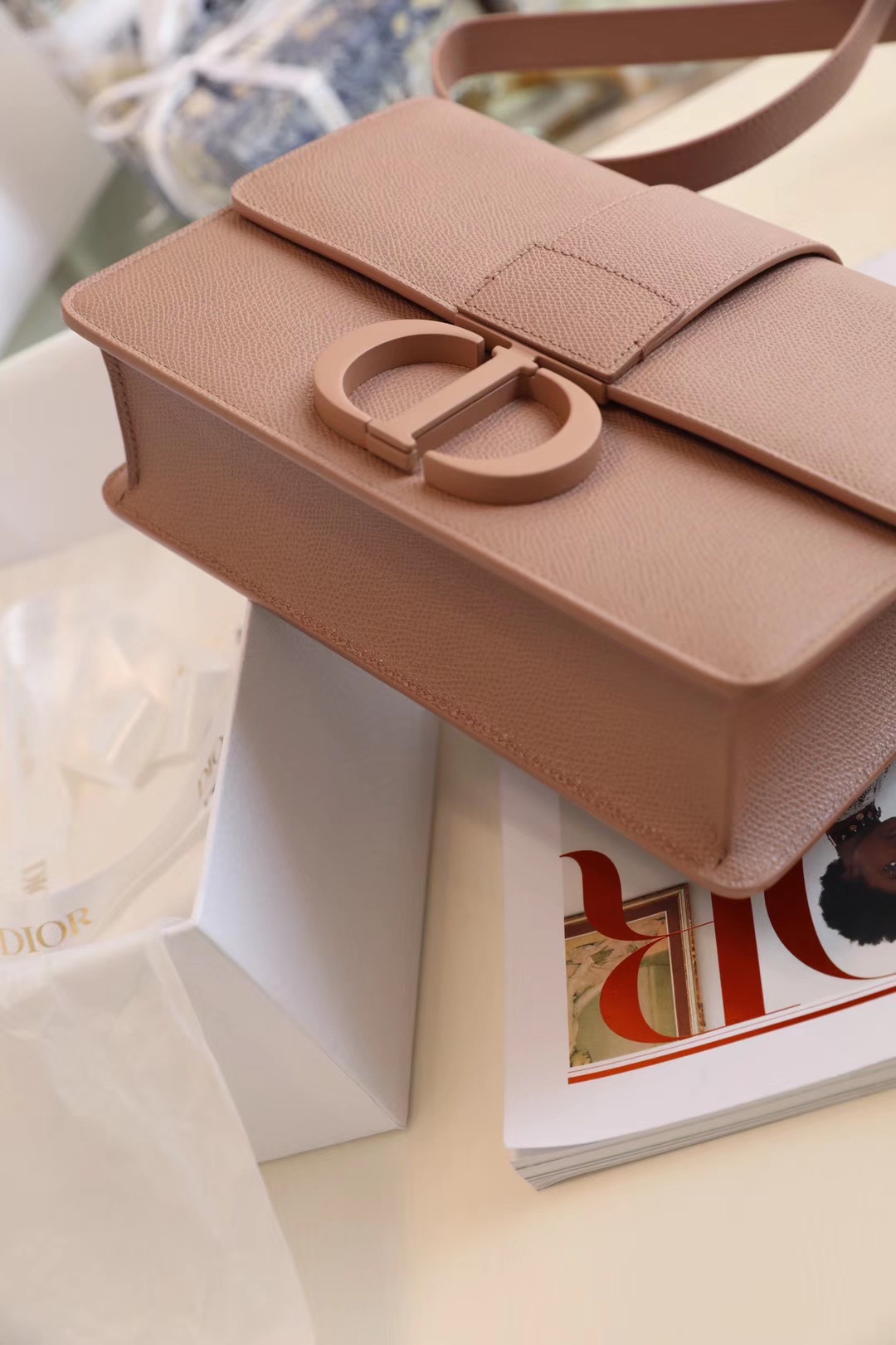 Montaigne palm print cow leather flap bag