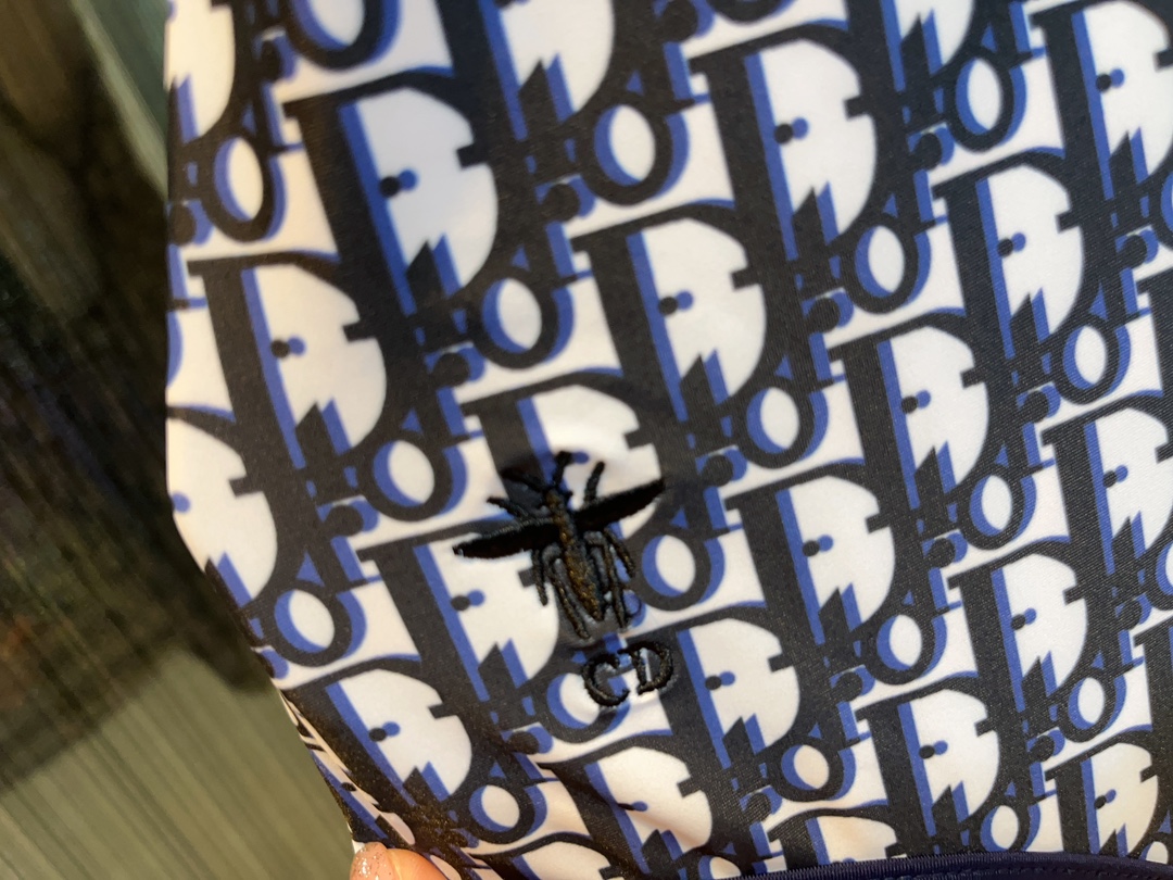 Dior long-sleeved one-piece swimsuit with sun protection