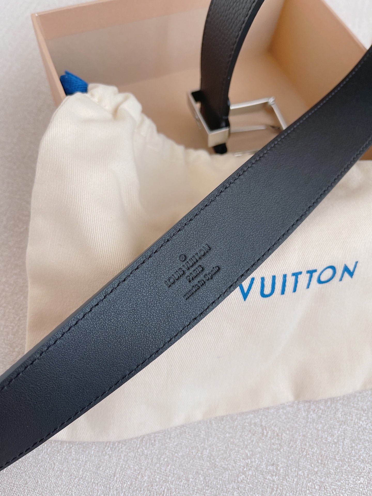 LOUIS VUITTO natural calfskin with Louis Vuitton signature design elements