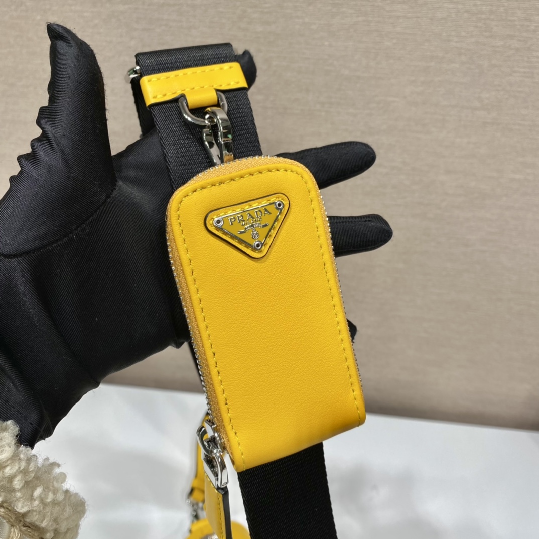 𝐏𝐑𝐀𝐃𝐀 Triangle Crossbody Bag 1BH190