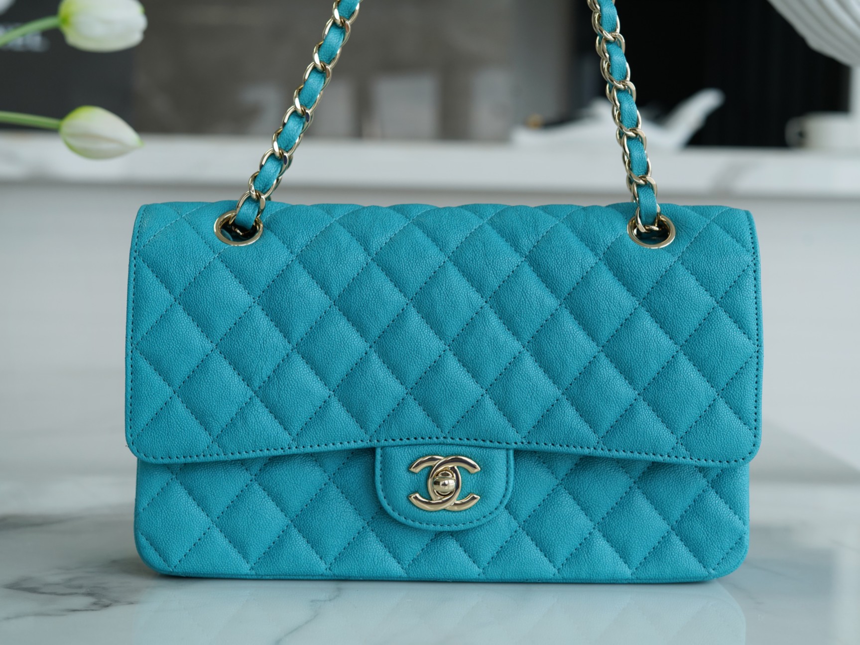 𝐂𝐇𝐀𝐍𝐄𝐋 Classic Flap washed cowhide is made from the most delicate newborn calves Washed fetal cow Medium Peacock Blue