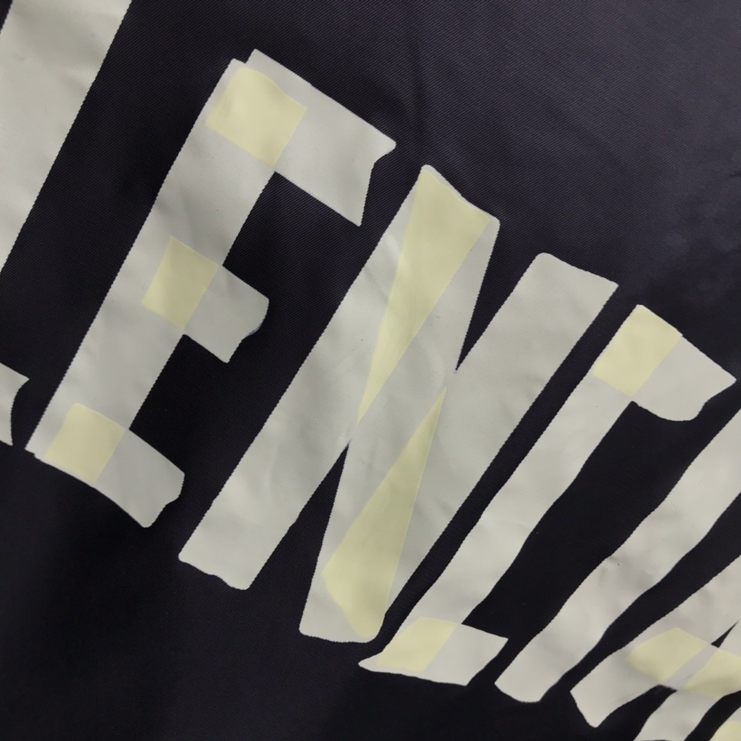 Balenciaga masking tape trench coat