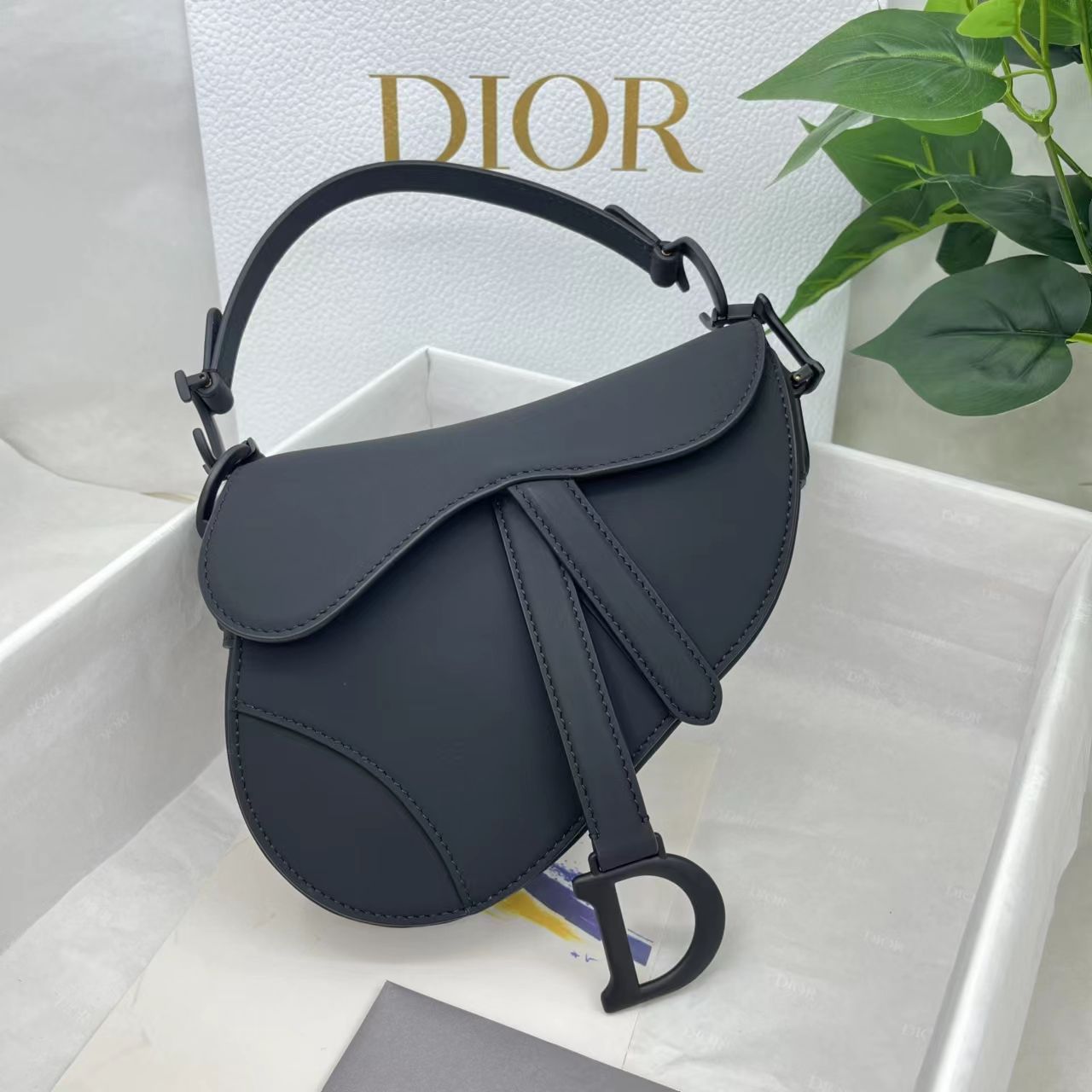 Dior saddle scrub series