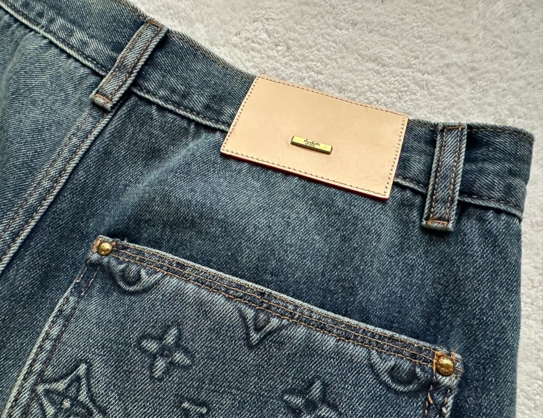 Louis Vuitton...three-dimensional embossed denim trousers