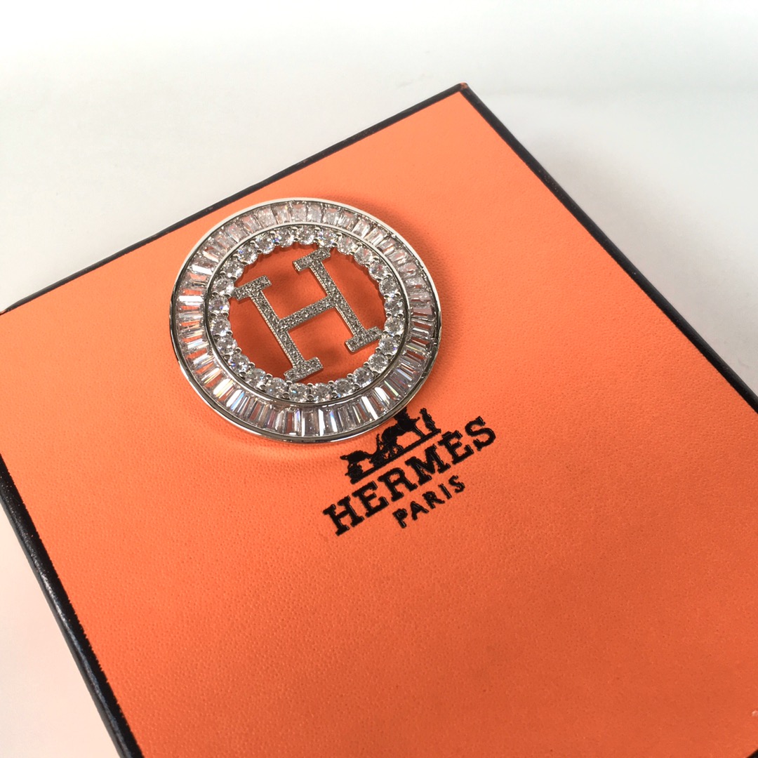 Hermes brooch