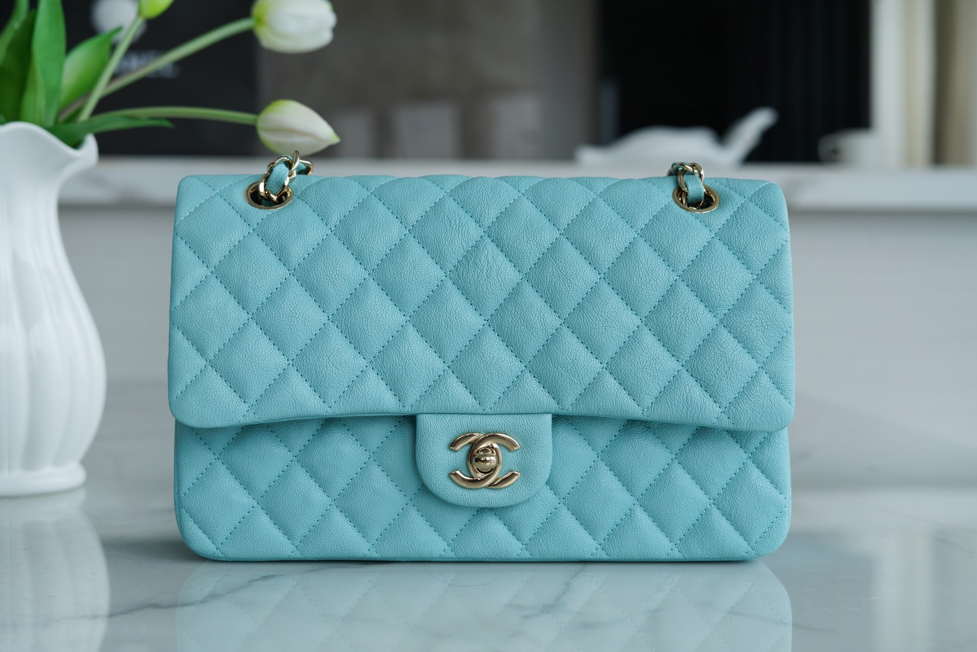 𝐂𝐇𝐀𝐍𝐄𝐋 Classic Flap washed cowhide is made from the most delicate of newborn calves Washed fetal cow Medium Tiffany Blue