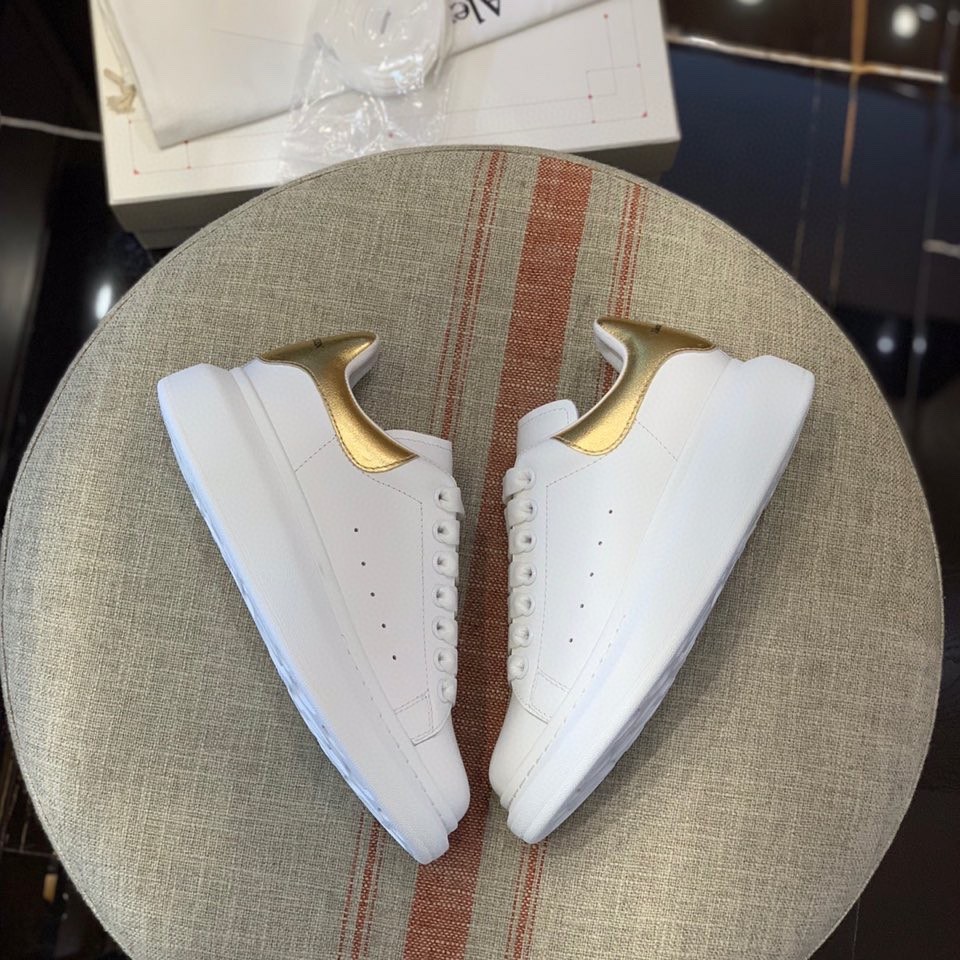 Alexander McQueen MQ Gold cowhide tail Sneakers