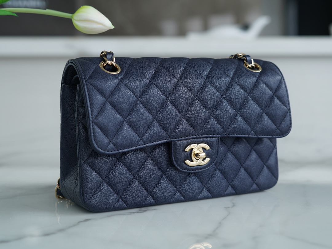 𝐂𝐇𝐀𝐍𝐄𝐋 Classic Flap washed cowhide is made from the most delicate newborn calves washed fetal cow small dark blue