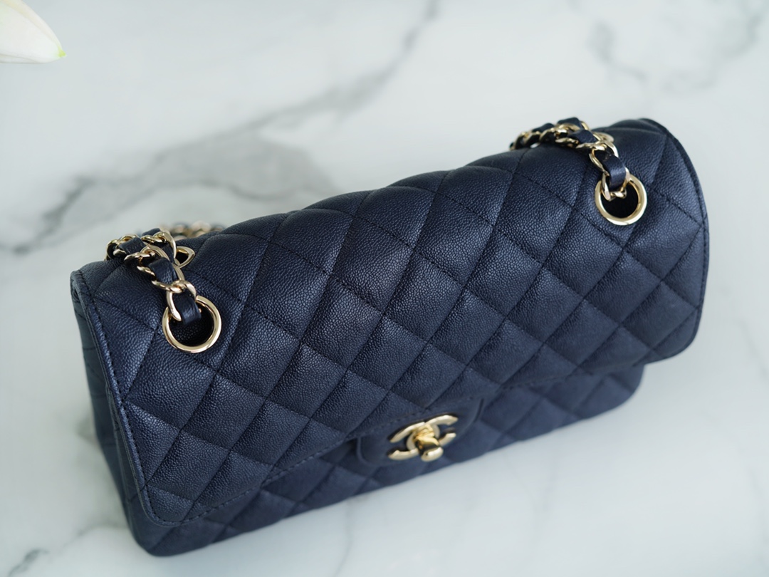 𝐂𝐇𝐀𝐍𝐄𝐋 Classic Flap washed cowhide is made from the most delicate newborn calves washed fetal cow small dark blue