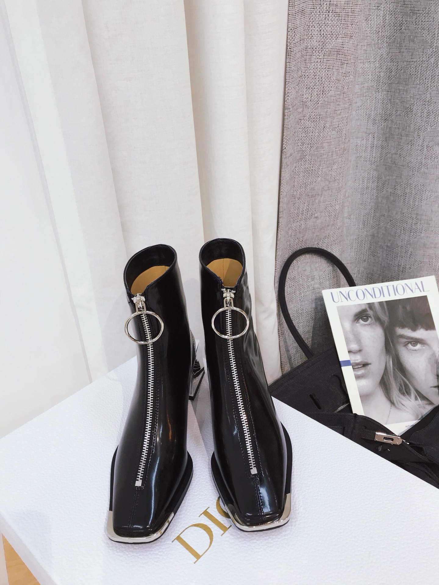 Lost in echo boots with large round buckle