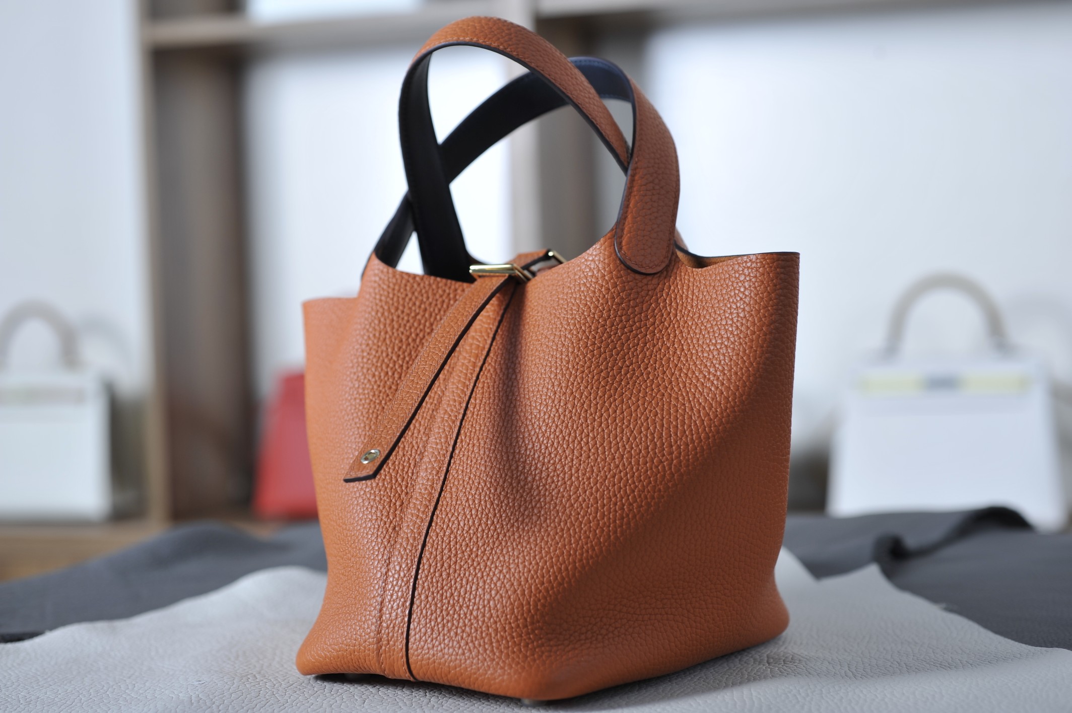 picotin18 classic orange with midnight blue TC leather on the wrist