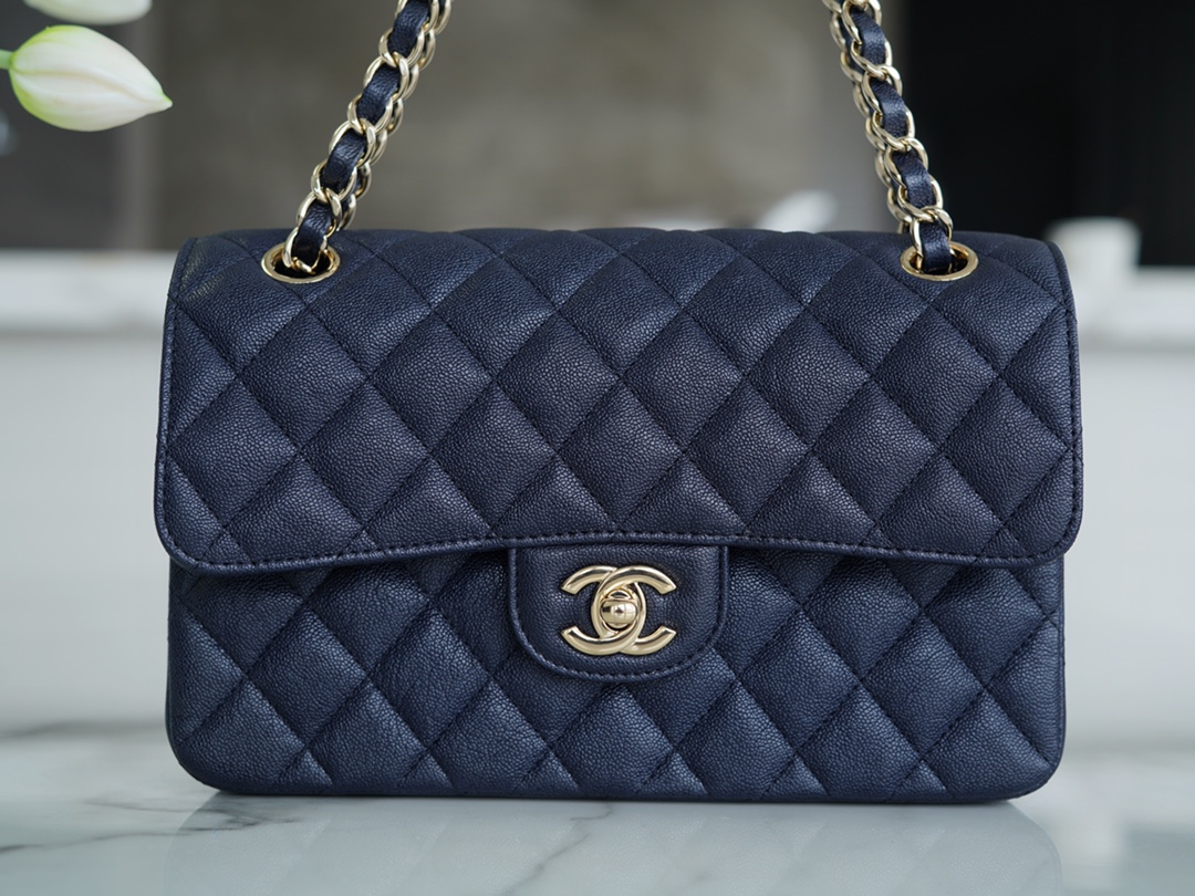 𝐂𝐇𝐀𝐍𝐄𝐋 Classic Flap washed cowhide is made from the most delicate newborn calves washed fetal cow small dark blue