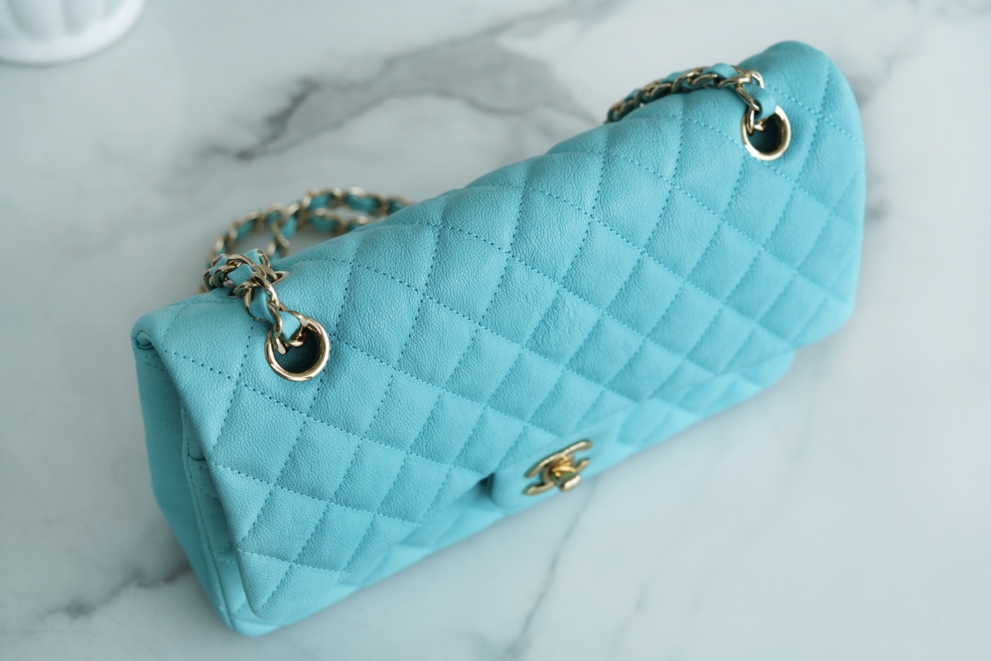 𝐂𝐇𝐀𝐍𝐄𝐋 Classic Flap washed cowhide is made from the most delicate of newborn calves Washed fetal cow Medium Tiffany Blue