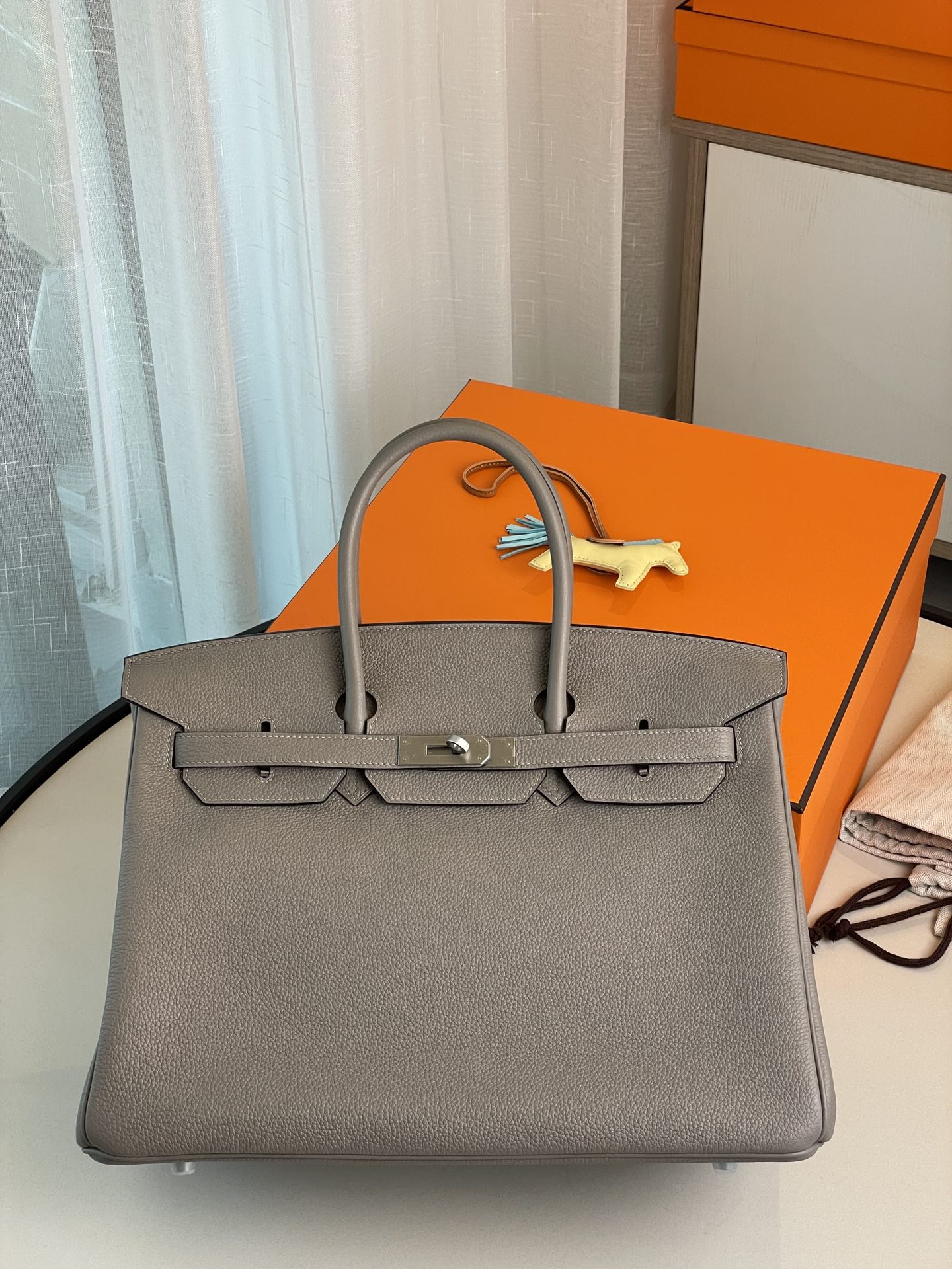 Bk35 asphalt grey togo leather with denim blue matte silver buckle