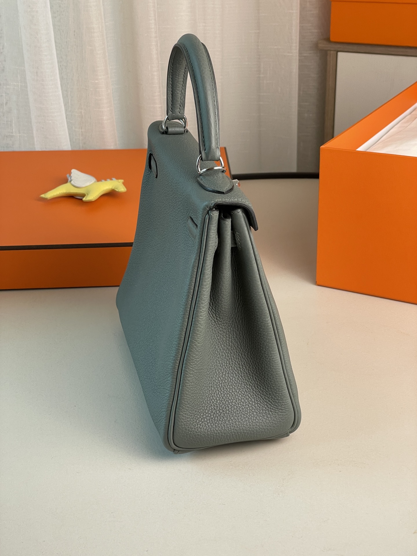 Kelly25 almond green togo leather silver buckle