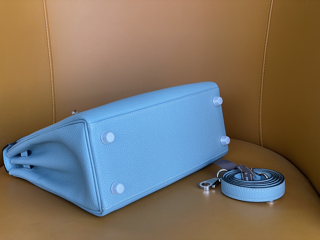 Kelly25 days cyan togo leather