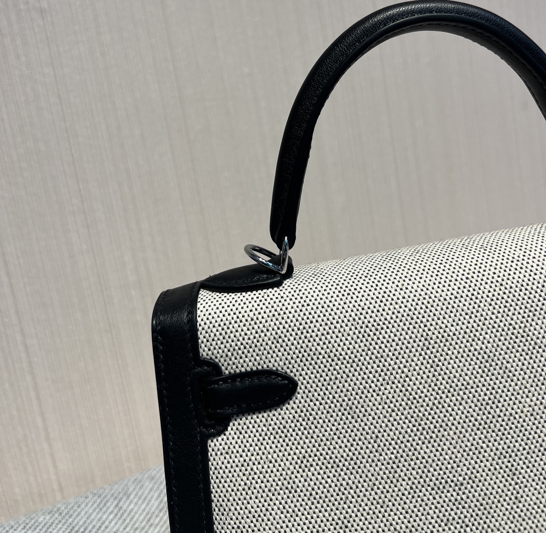 Kelly 25 canvas and swift leather second-hand bag