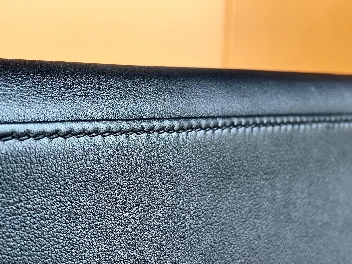 Kelly32 black gold swift leather