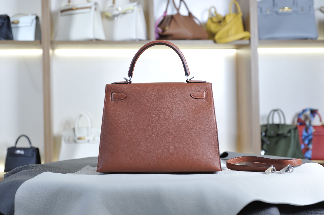 Kelly 28 brick red silver buckle French sheepskin