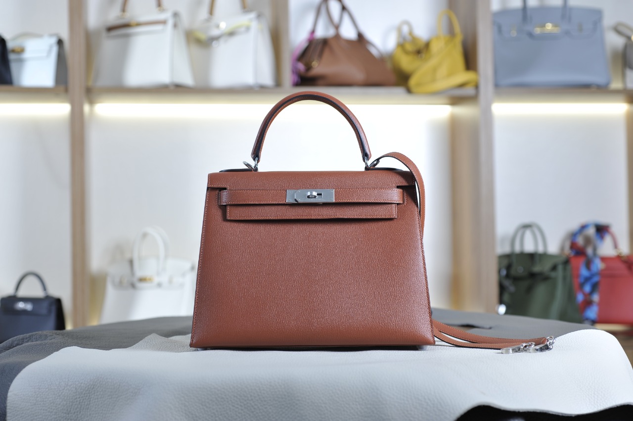 Kelly 28 brick red silver buckle French sheepskin