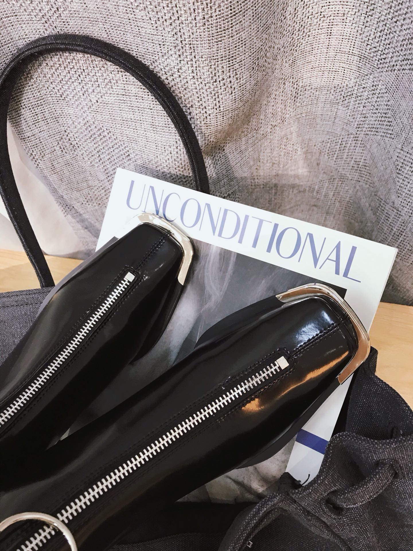 Lost in echo boots with large round buckle