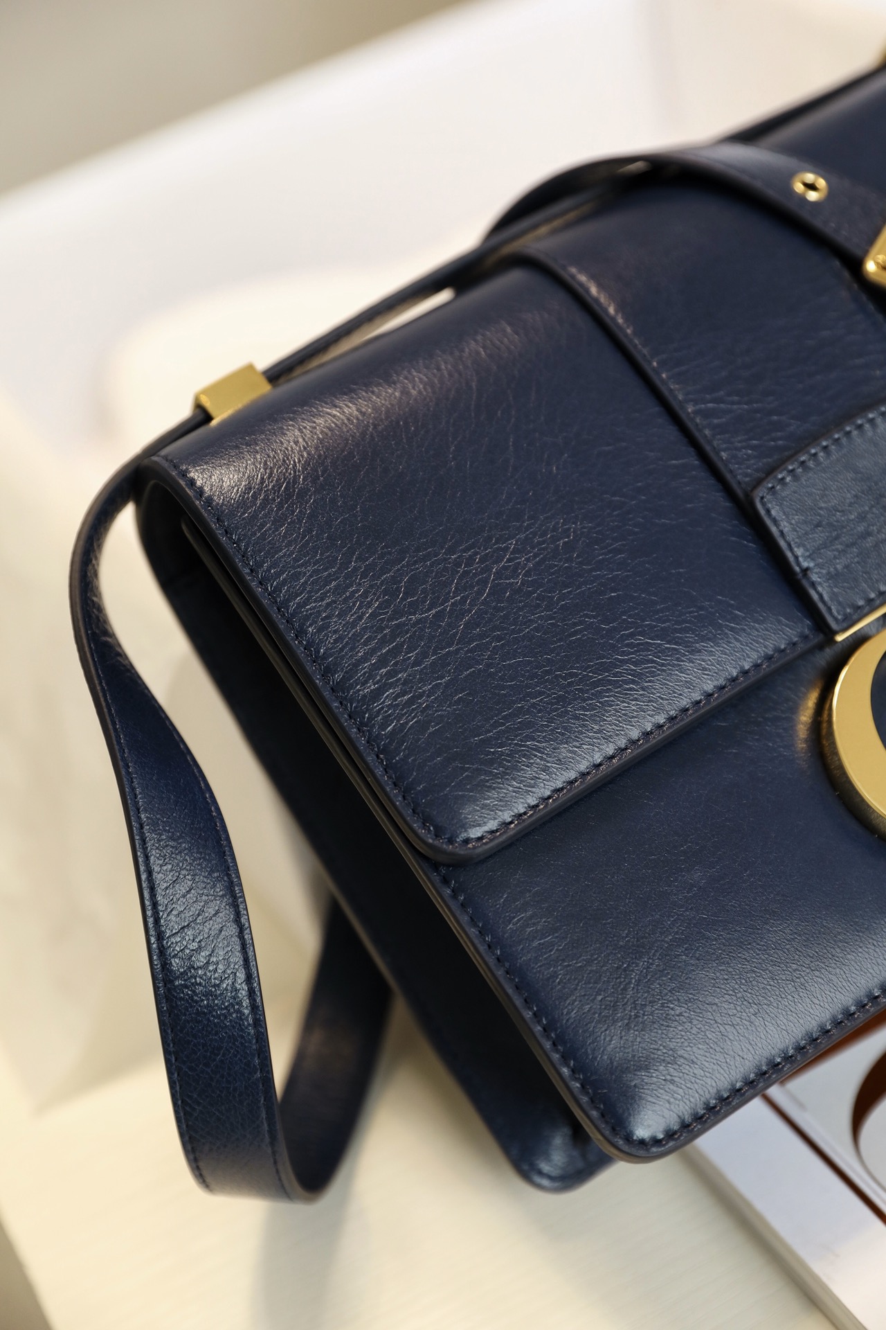 Montaigne oil-waxed sheepskin navy blue