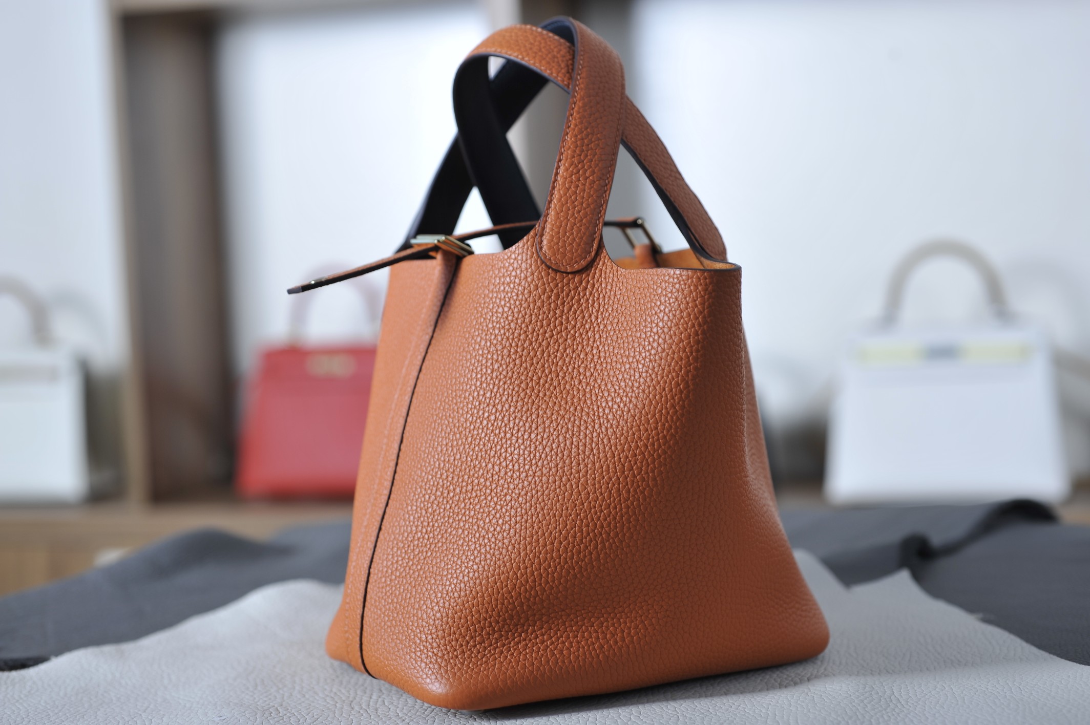 picotin18 classic orange with midnight blue TC leather on the wrist