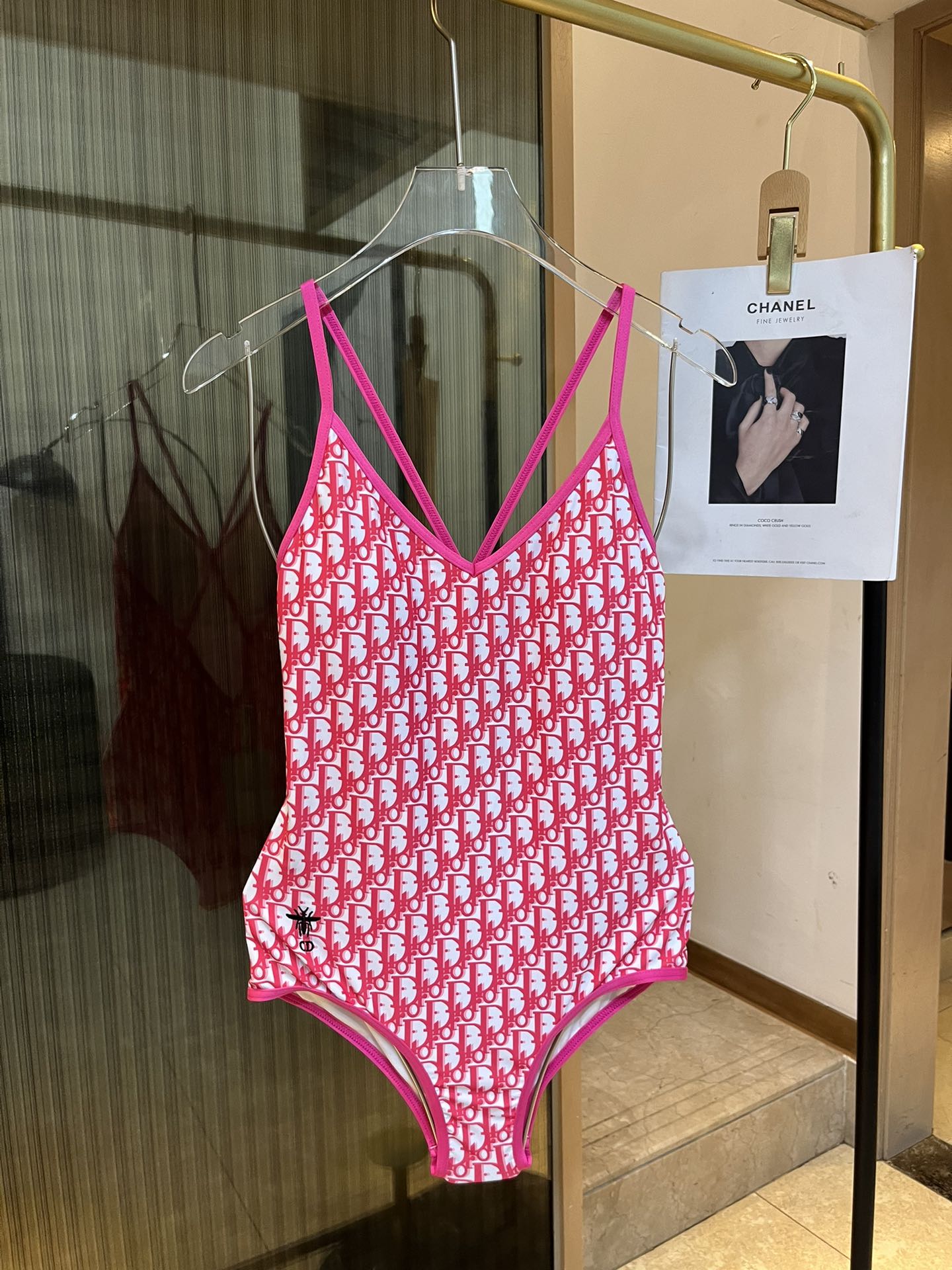 Dior long-sleeved one-piece swimsuit with sun protection
