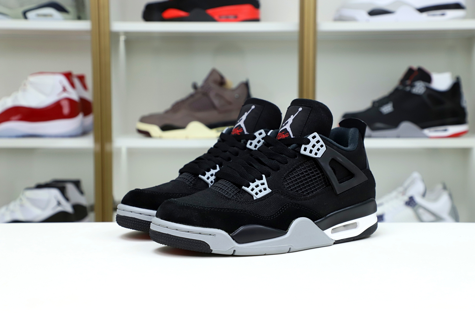 AIR JORDAN 4 BLACK CANVAS