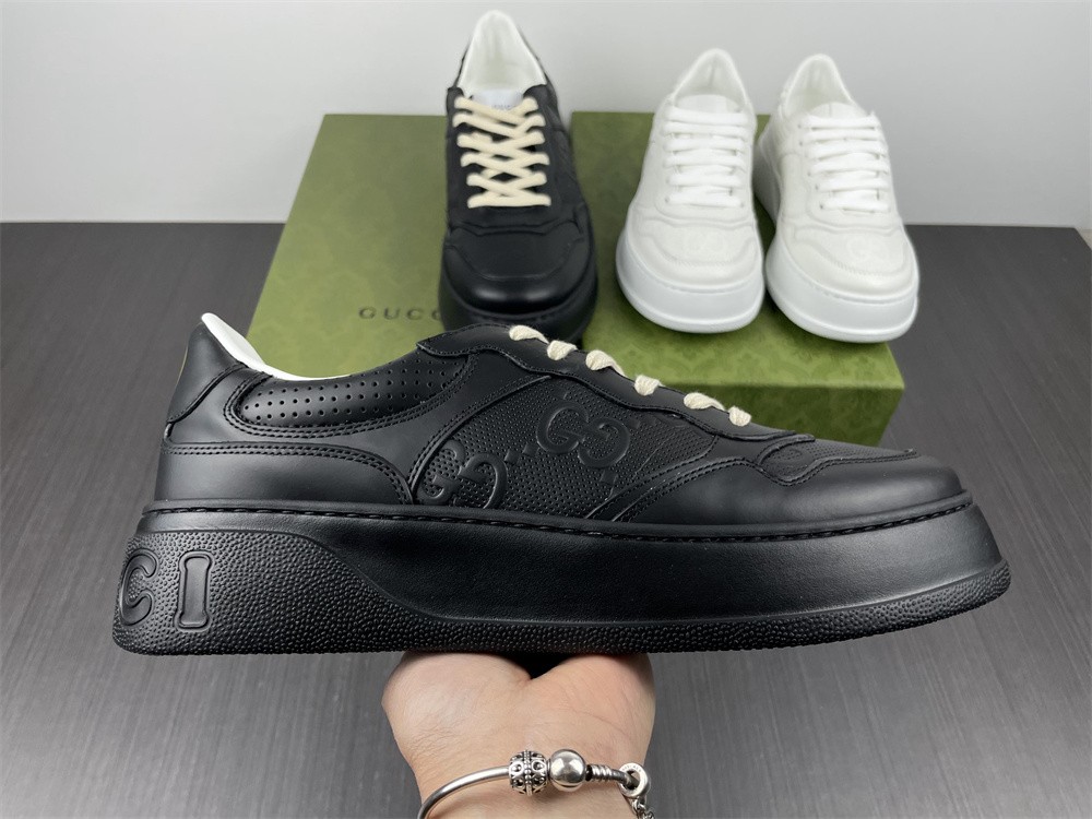 Gucci Men GG embossed sneaker in black leather