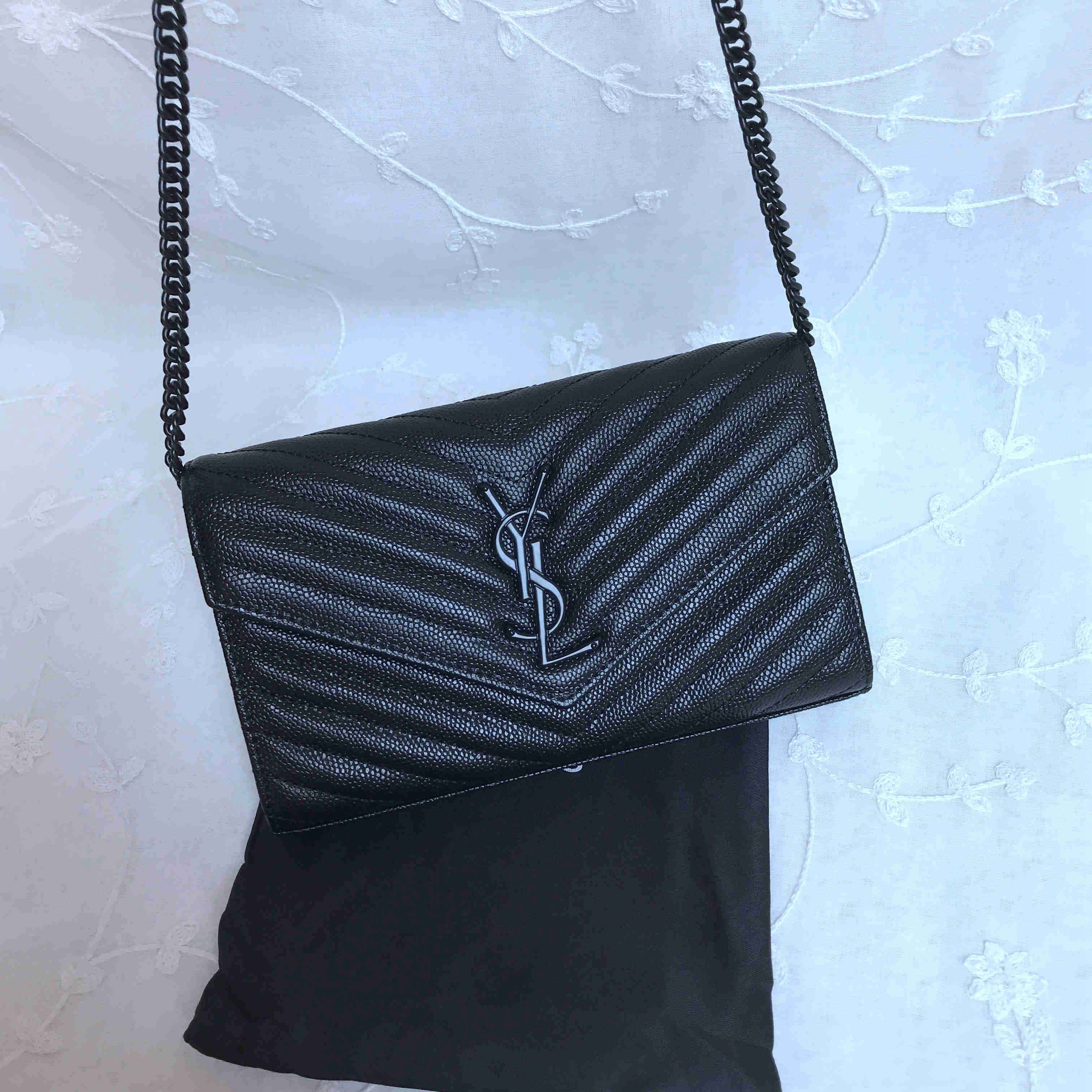 MONOGRAM CHAIN WALLET IN GRAIN DE POUDRE EMBOSSED LEATHER