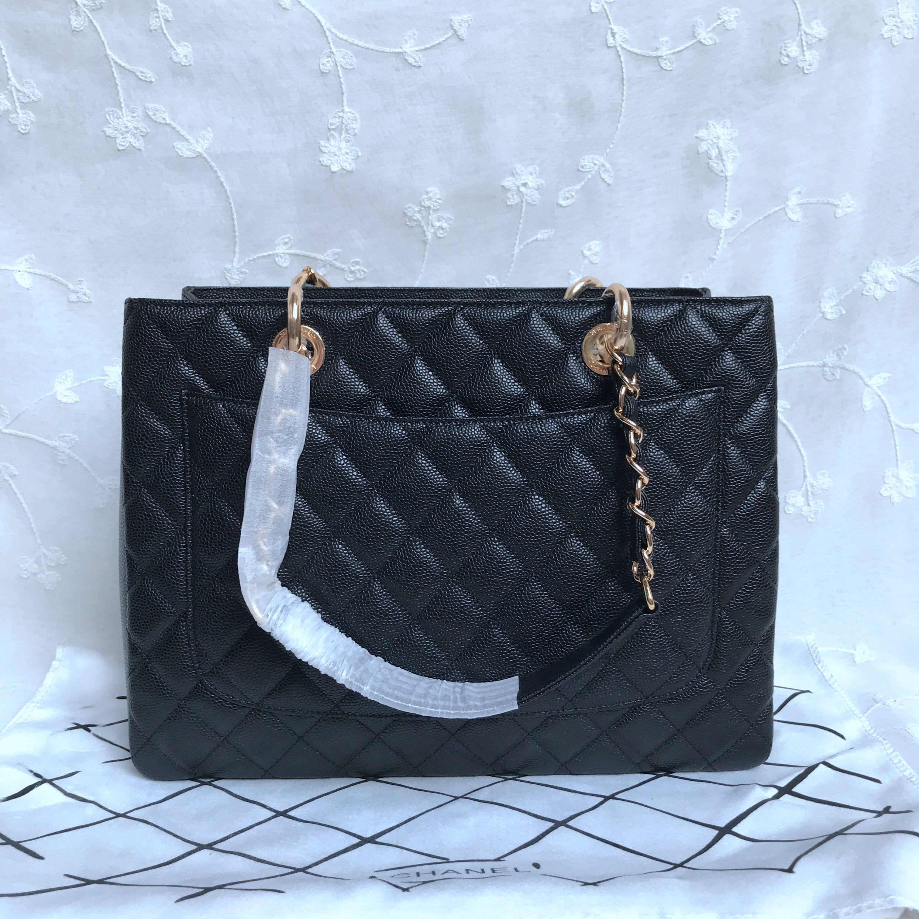 Chanel Classic Caviar quilted grand shopping tote gst