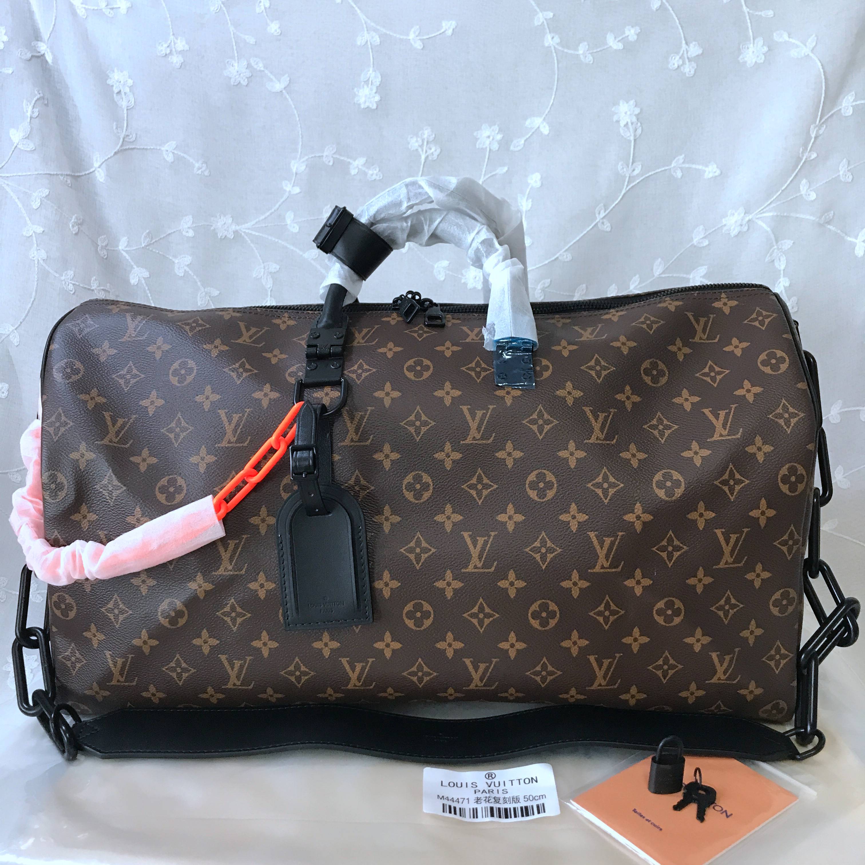 LV Travelbag  M44471