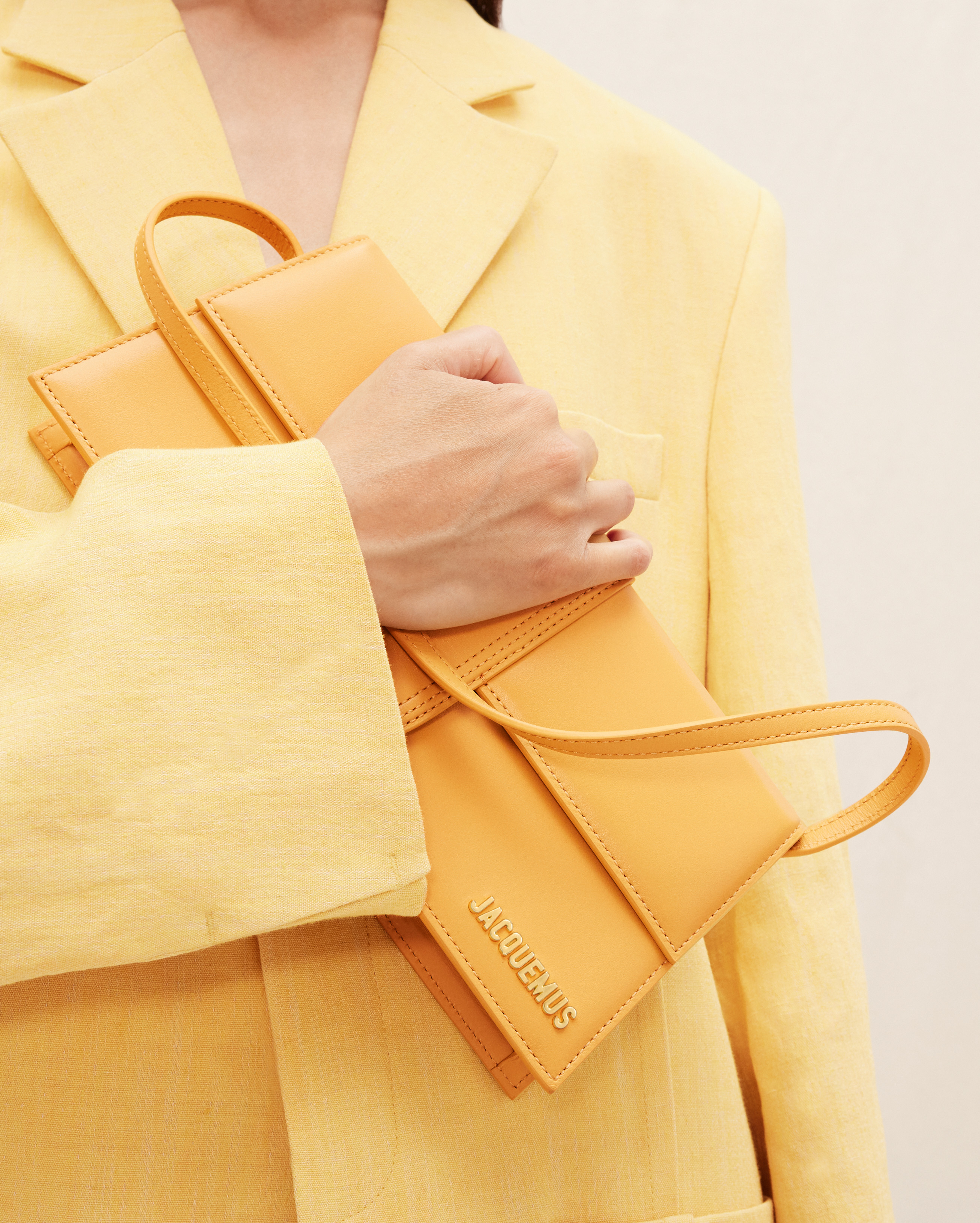 jacquemus Le Bambino long LE RAPHIA Long flap bag.