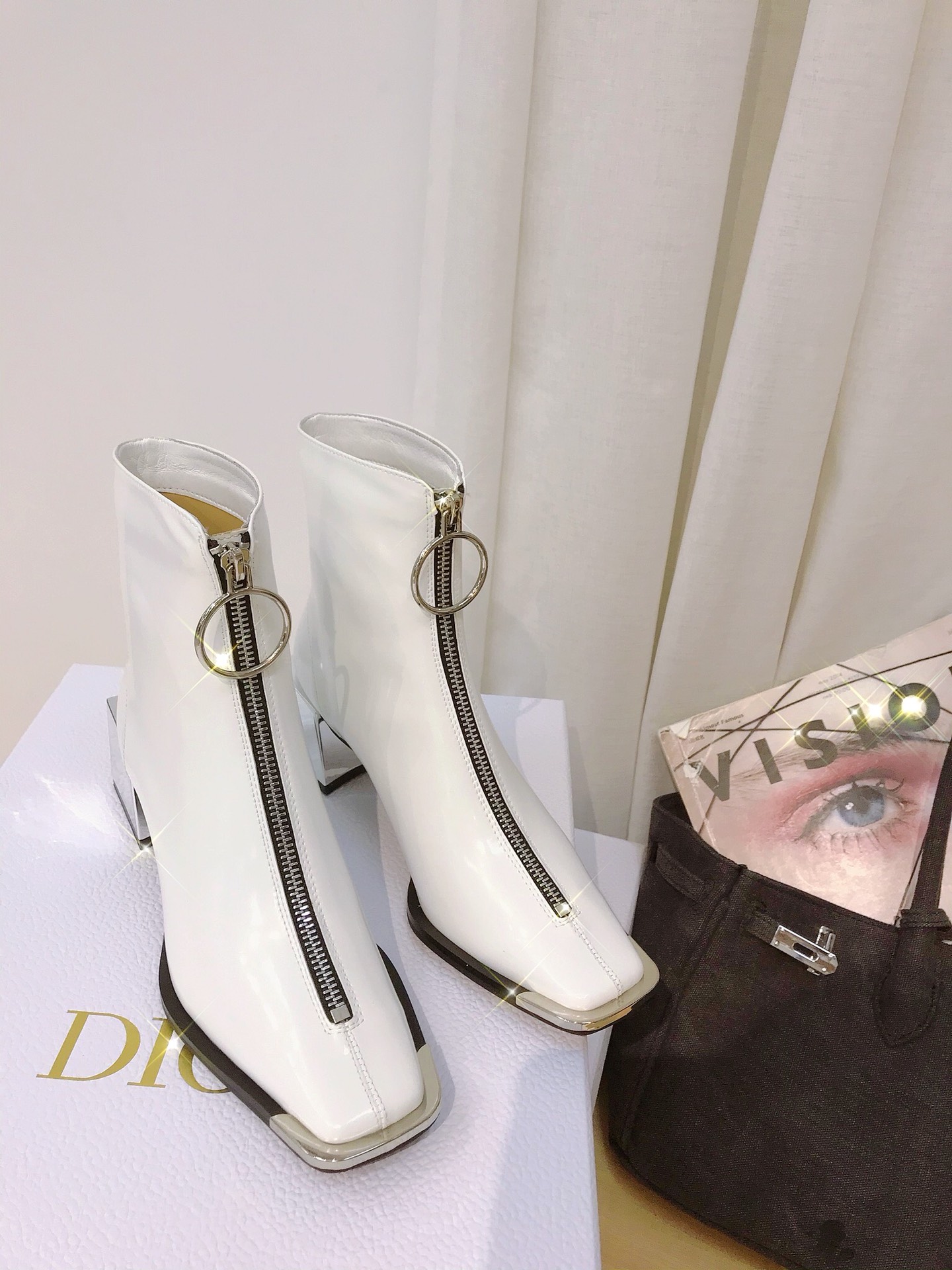 Lost in echo boots with large round buckle