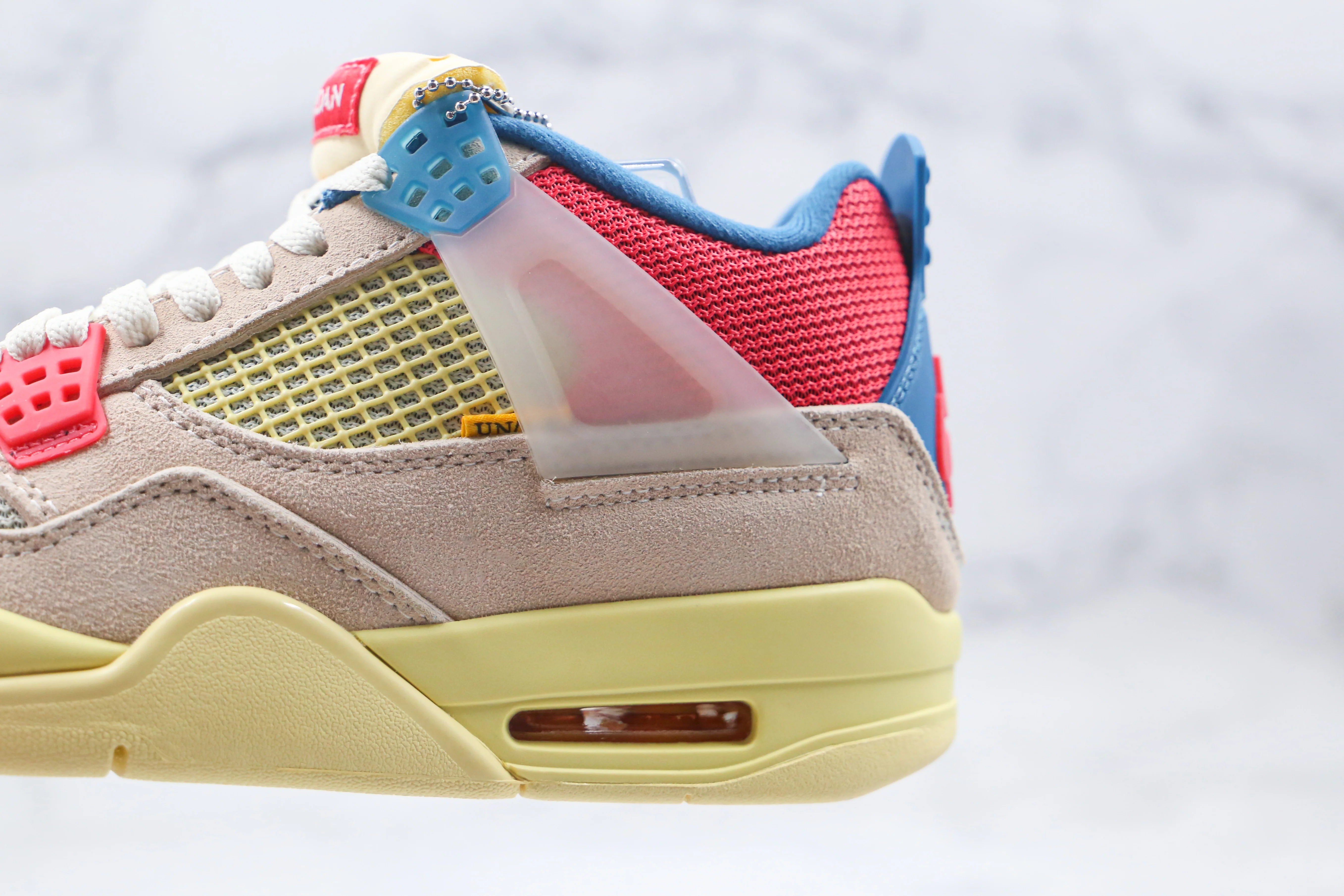 Réplica AIR JORDAN 4 “unión Guava Ice Nike Sneaker