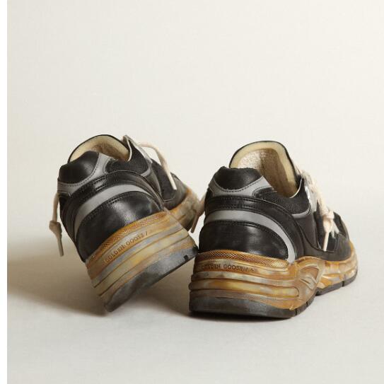 Golden Goose GGDB Mens Sneaker Shoes Dad-Star in black mesh and nappa with ice-colored star