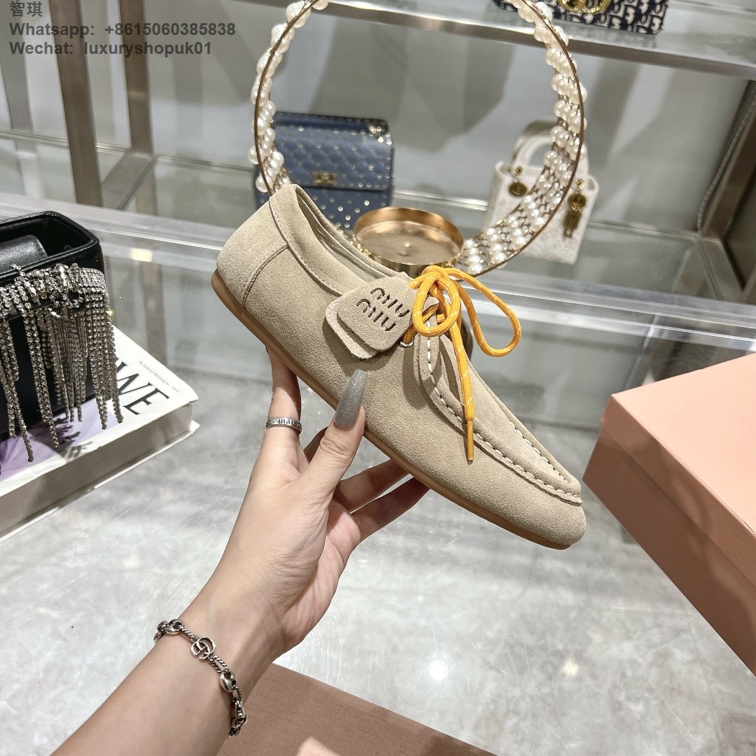 Miu Miu logo-embossed suede loafers tie-detailing round toe Women flat shoes