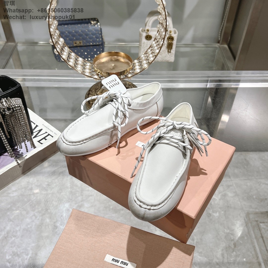 Miu Miu logo-embossed suede loafers tie-detailing round toe Women flat shoes