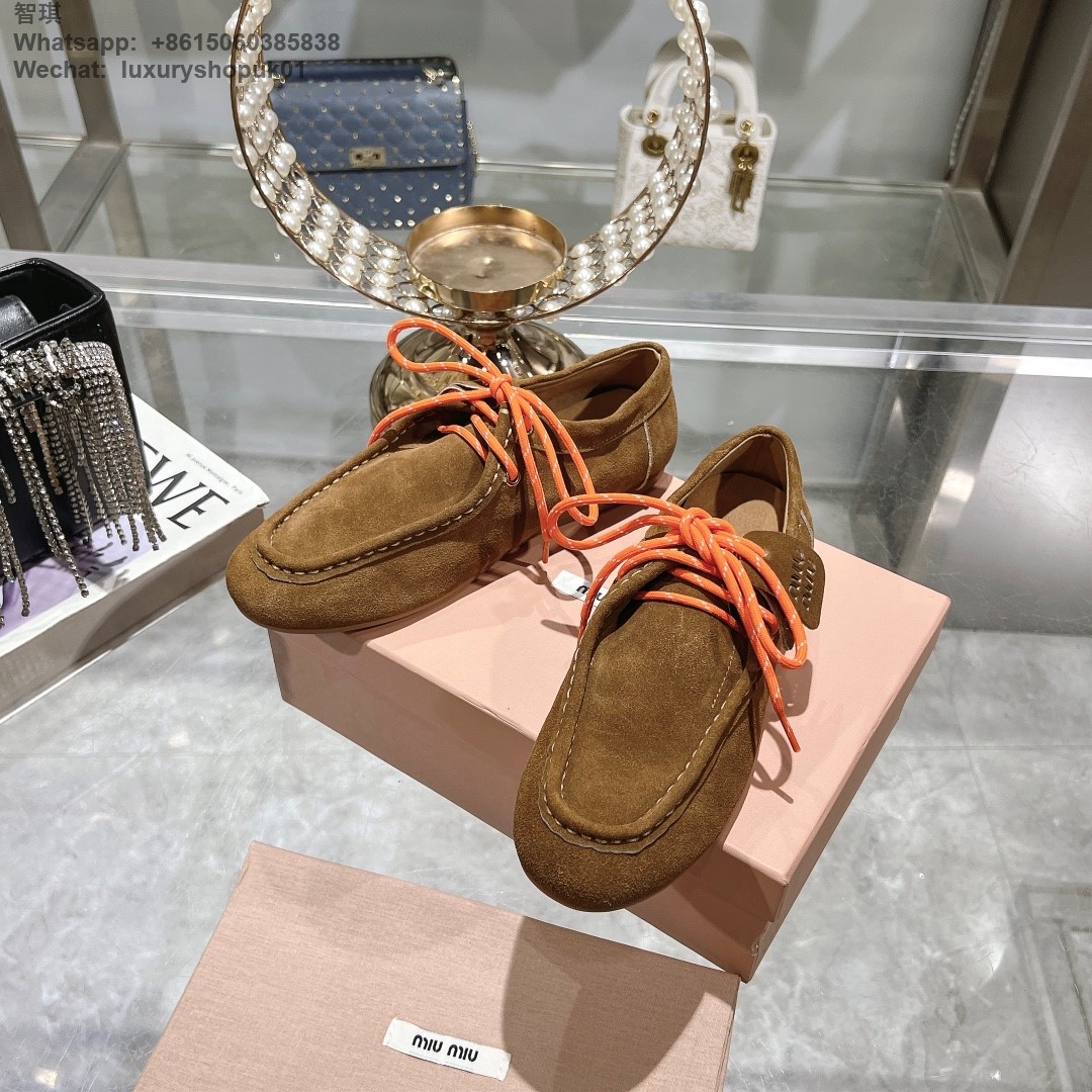 Miu Miu logo-embossed suede loafers tie-detailing round toe Women flat shoes