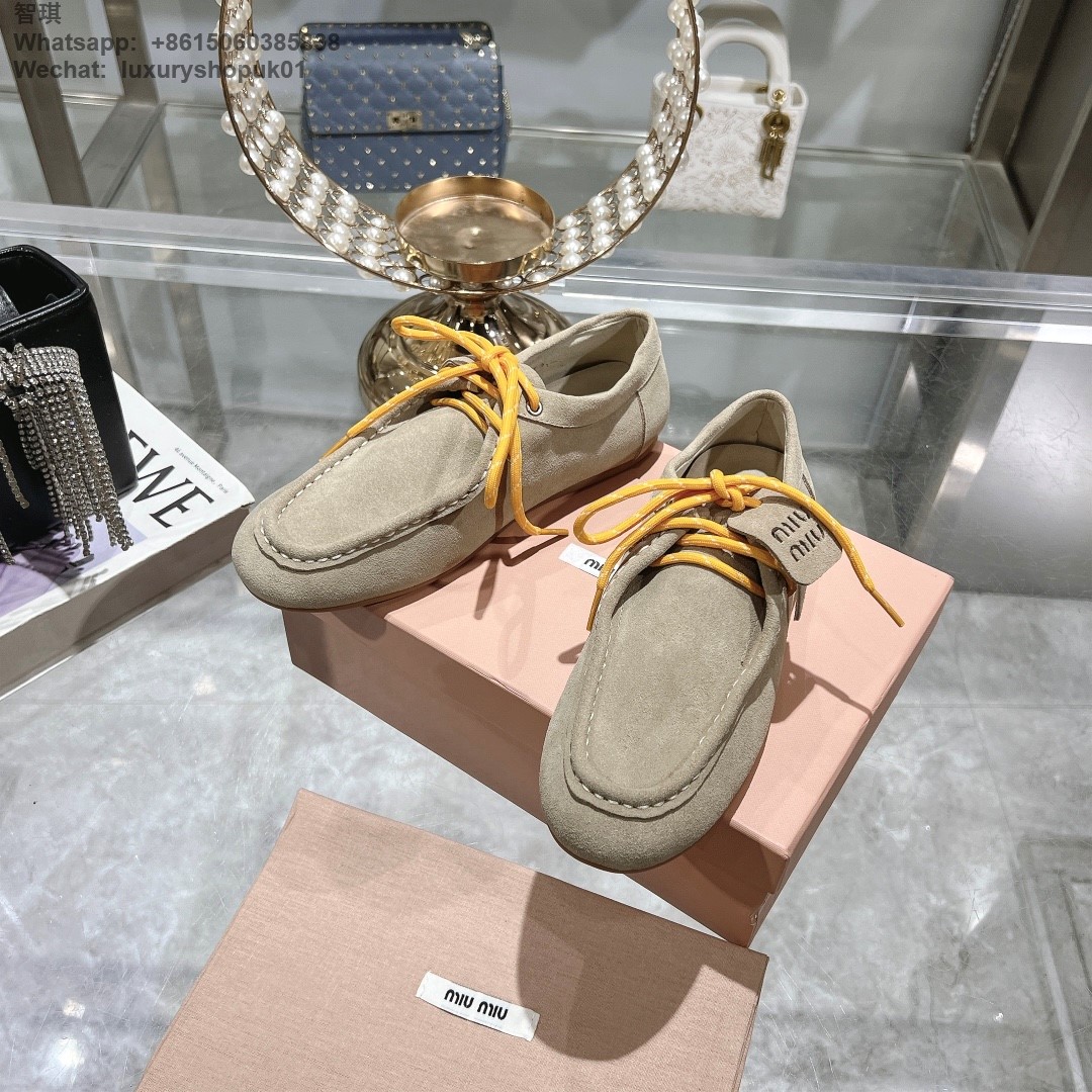 Miu Miu logo-embossed suede loafers tie-detailing round toe Women flat shoes