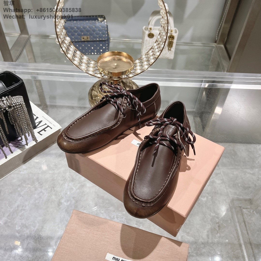 Miu Miu logo-embossed suede loafers tie-detailing round toe Women flat shoes